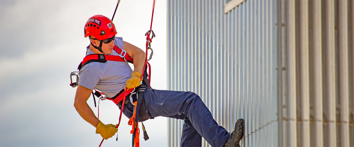 Fireman in repelling training exercise.