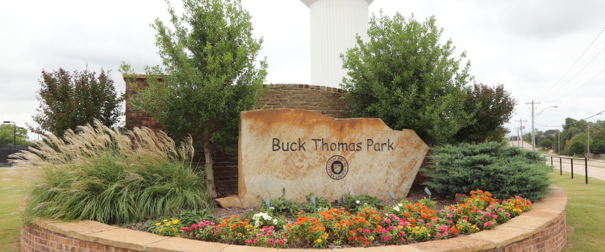 photo of the rock engraved sign saying Buck Thomas Park
