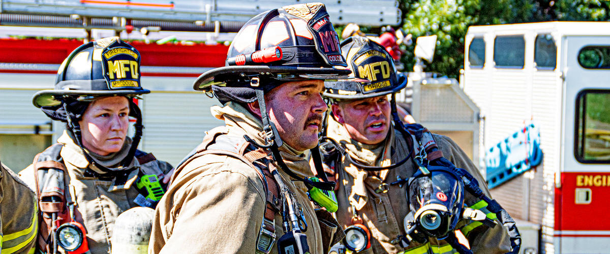 Firemen at the scene of a fire.