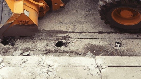 Road Construction Vehicle repairing compromised road